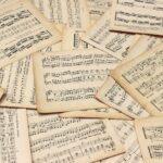 Illustration of Exploring the History of Music Notation Across Centuries